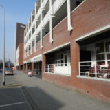 Woningen met winkelruimte, Oosterhamriklaan